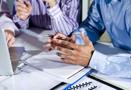 Image of hands on desk